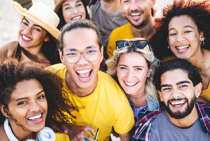 Portrait Of Happy People Looking At The Camera And Smiling, Young Guys And Girls Of Generation Z At Music Festival, P...