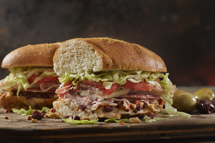 Muffuletta, Italian Sandwich With Olive , Roasted Peppers And Artichoke Spread - A Heartbreaking Subway AD Of Stagger...