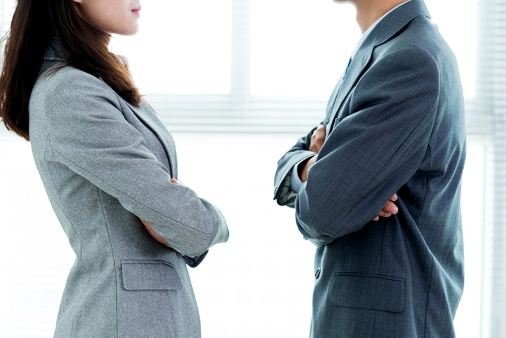 Two Businesspeople Standing Face To Face - Advertising In The Age Of Anger And Conflict