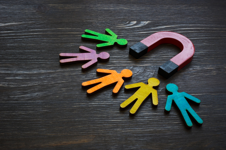 Magnet And Figures Of People. Customer Acquisition And Retention. - Branding To Survive The Micro-Moment