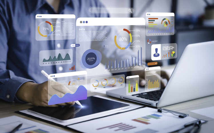 An Analyst Uses A Computer And Dashboard For Data Business Analysis And Data Management System With Kpi And Metrics C...
